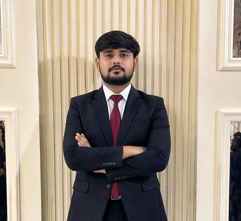 Muhammad Muhid wearing a suit